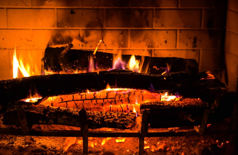 Fireplace at  Alaska Legends Adventure Resort.