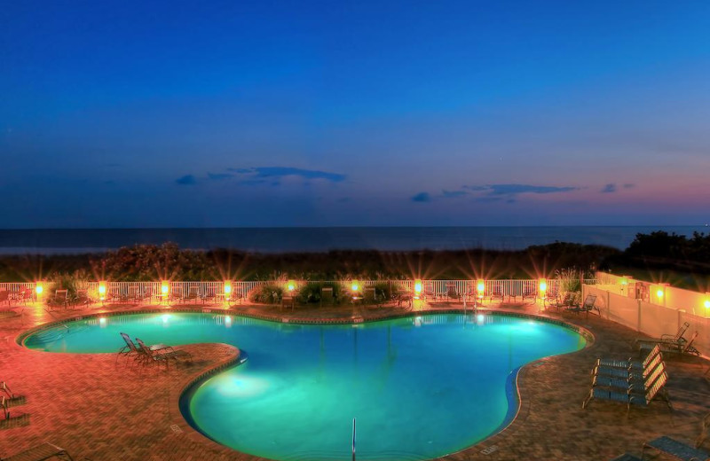 Outdoor pool at Sunset Vistas Beachfront Suites.