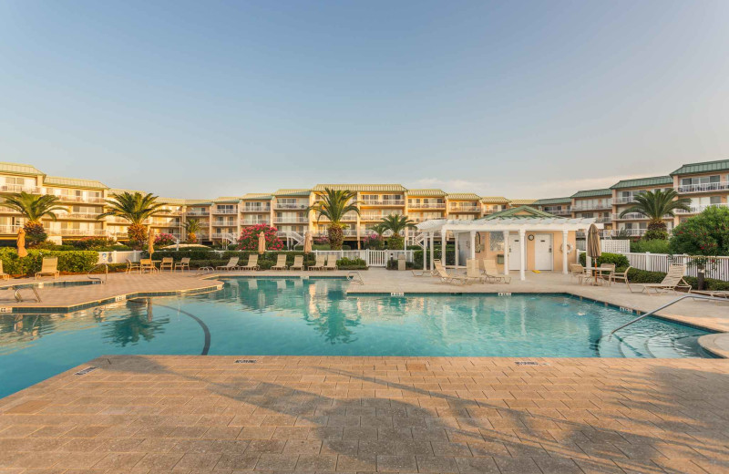 Outdoor pool at Real Escapes Properties - St. Simons Grand 224.