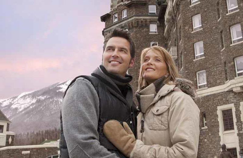 Couple outside The Fairmont Banff Springs.