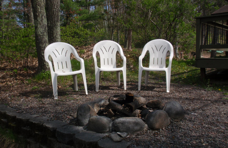 Cabin fire pit at Golden Rule Resort.