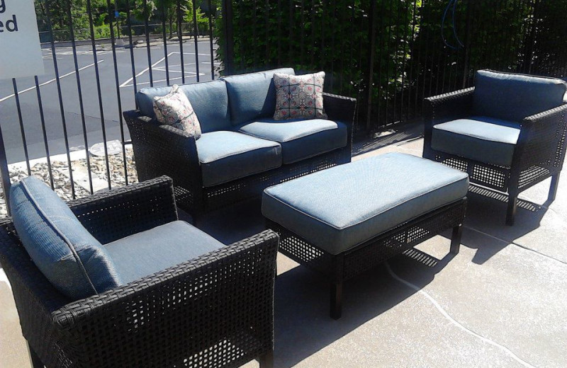 Pool patio chairs at Branson 76 Central Holiday Inn Express.