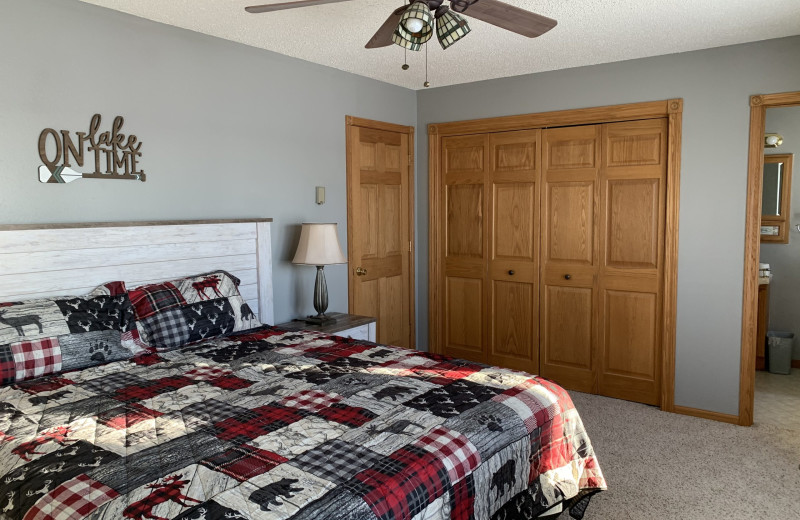 Cabin bedroom at Ten Mile Lake Resort -Otter Tail Country Lakes Tourism.