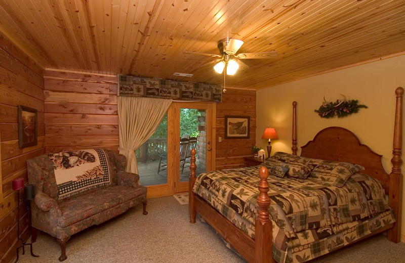 Cottage bedroom at Norfork Resort & Trout Dock.