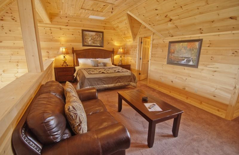 Cabin bedroom at Accommodations by Parkside Resort.