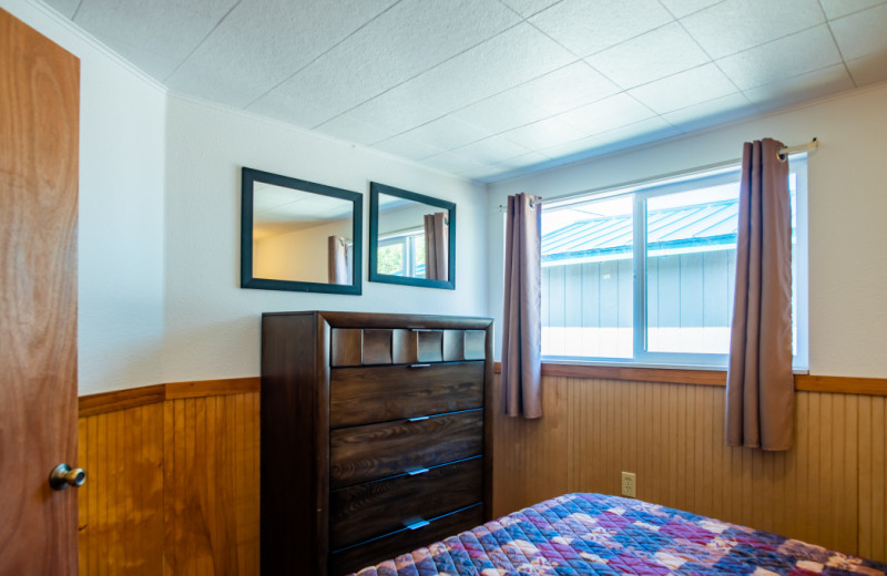 Cabin bedroom at Oceanside Ocean Front Cabins.