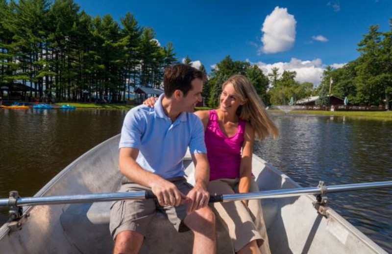 Couple on lake at Sunny Hill Resort & Golf Course.