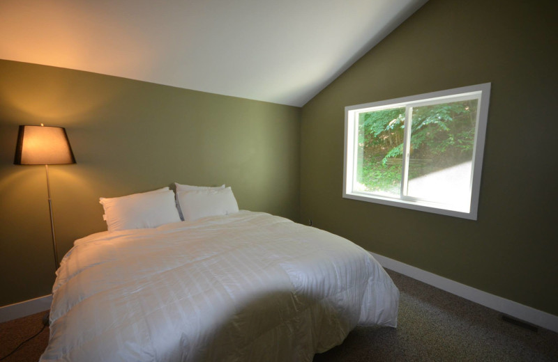 Rental bedroom at Visit Up North Vacation Rentals.