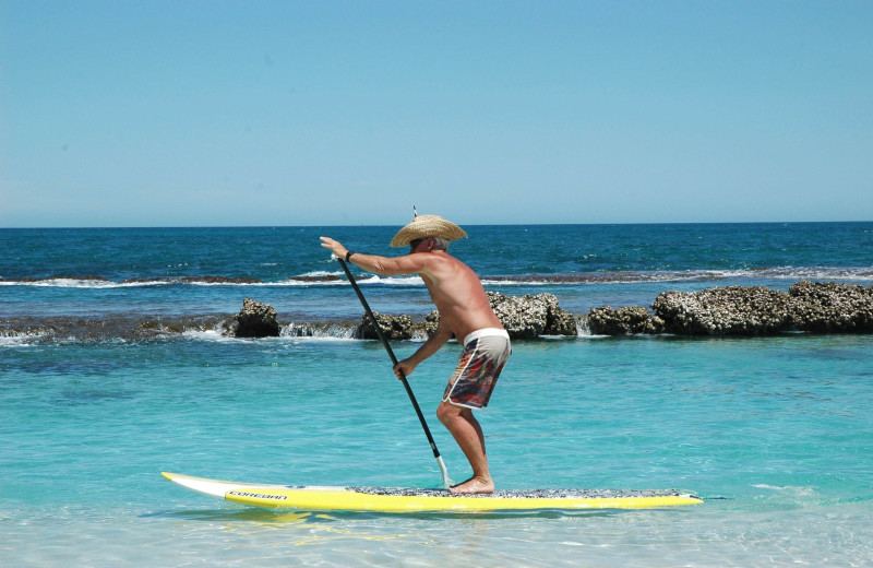 Paddle boarding at Tropical Shores Beach Resort.