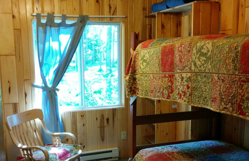 Cabin bedroom at Woodlawn Resort.