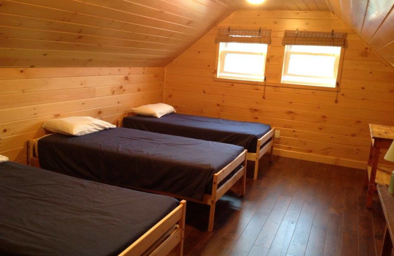 Cabin bedroom at Fernleigh Lodge.