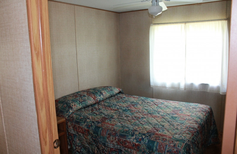 Cabin bedroom at South Turtle Lake Resort.