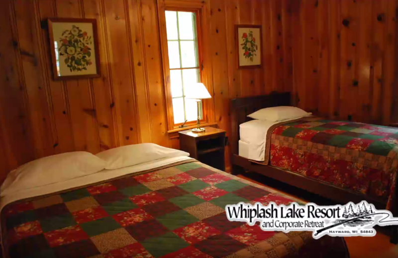 Cabin bedroom at Whiplash Lake Resort.