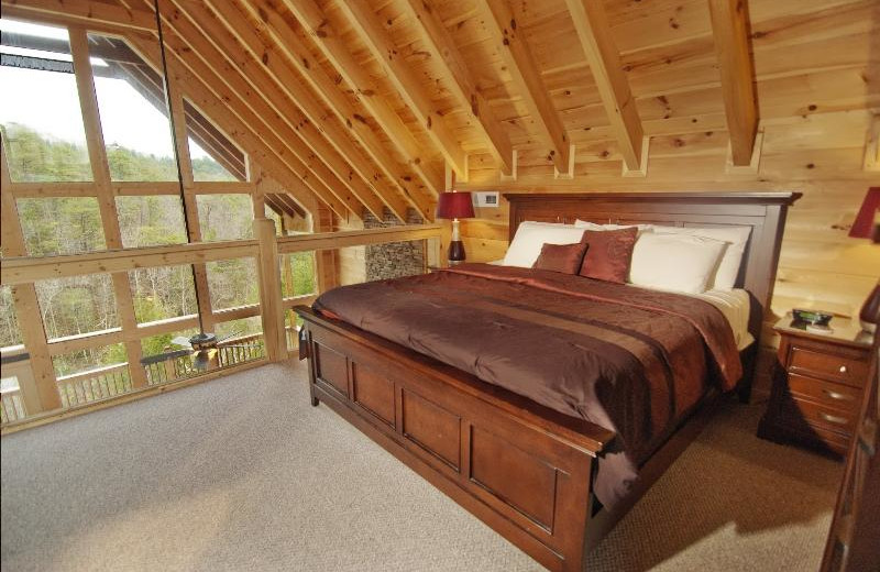 Cabin bedroom at Accommodations by Parkside Resort.