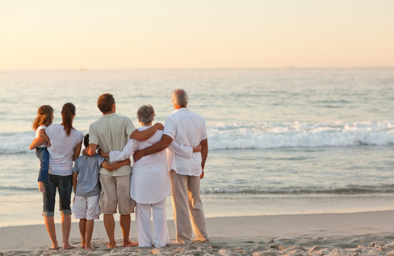 Family on beach at CBVacations.com