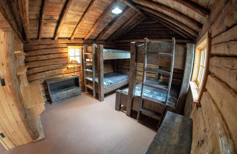 Cabin bedroom at Cliff Lake Resorts.