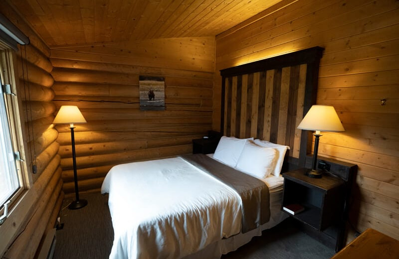 Cabin bedroom at 320 Guest Ranch.