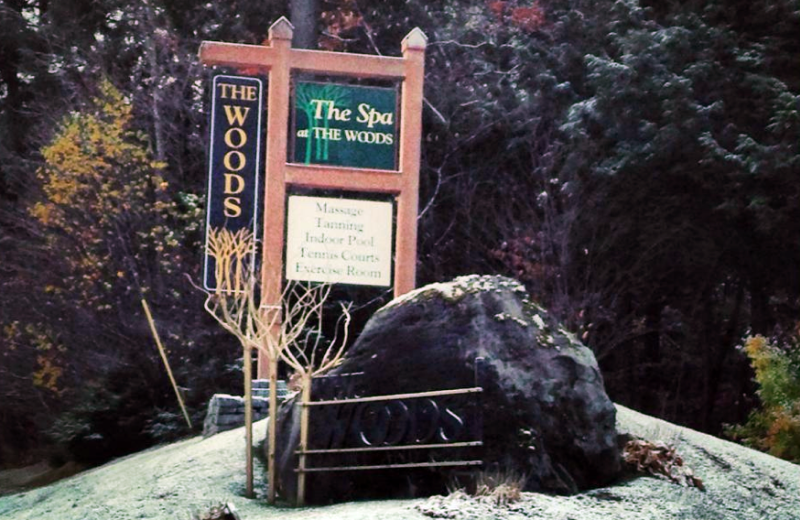 The Woods Resort & Spa sign.