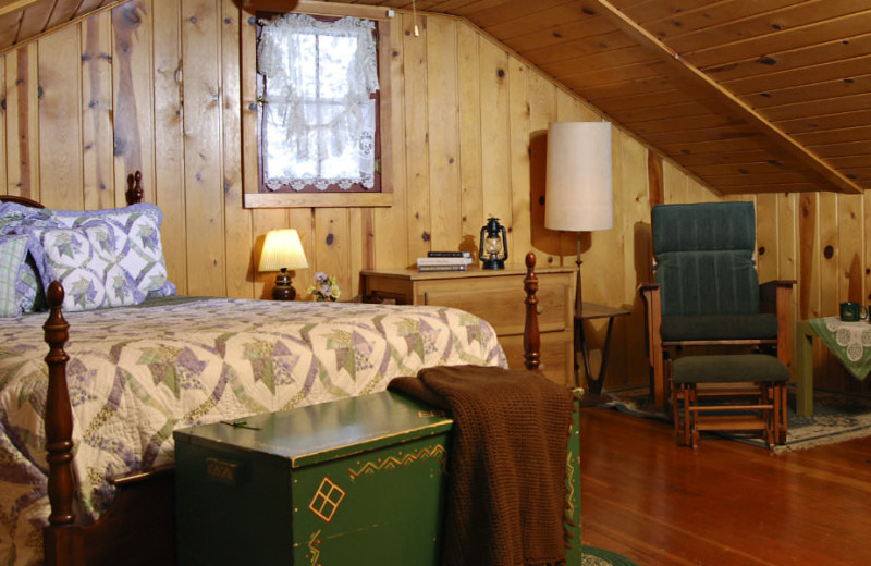Cottage bedroom at Rocky Mountain Lodge & Cabins.