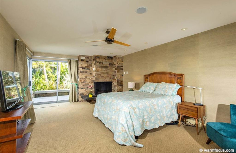 Rental bedroom at Vacation Rentals by McLain Properties.