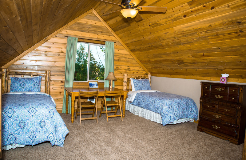 Cabin bedroom at Gentry River Ranch.