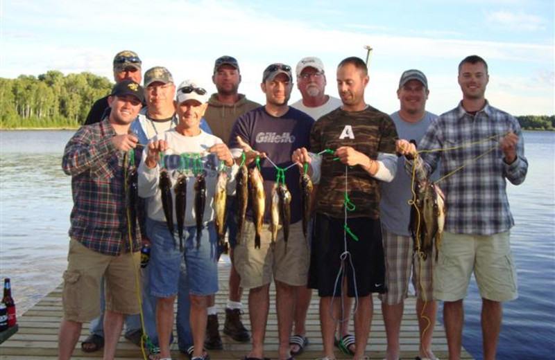 Family fishing at Gold Pines Camp.