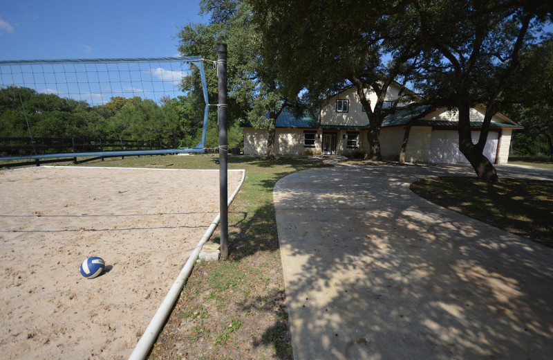 Rental volleyball court at Frio Family Getaway