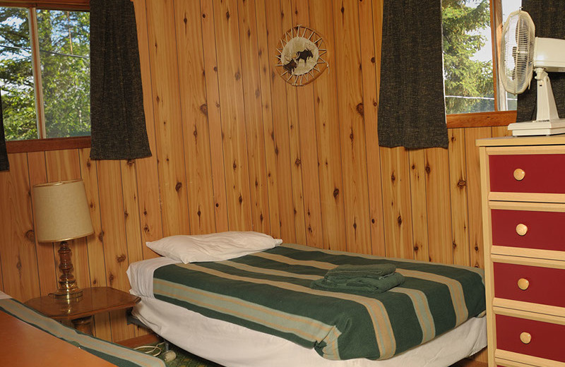 Cabin bedroom at Rough Rock Lodge.