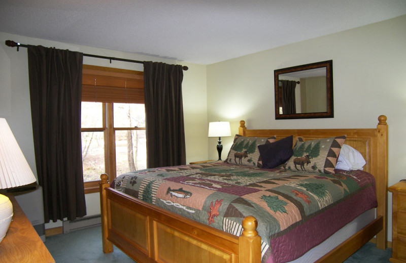 Vacation rental bedroom at Loon Reservation Service.