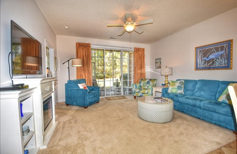 Rental living room at Barefoot Resort Rentals.