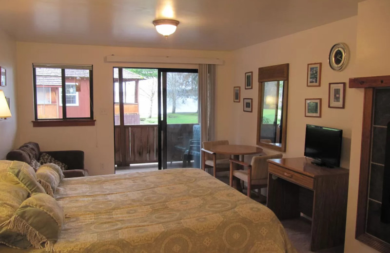 Cabin bedroom at Rain Forest Resort Village.