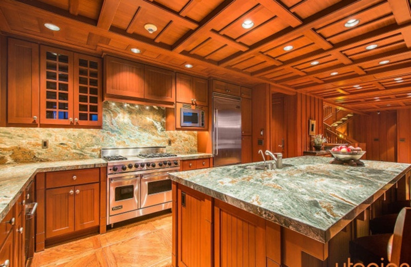 Rental kitchen at Utopian Luxury Vacation Homes.