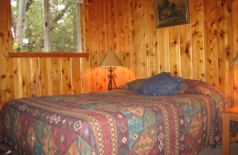 Cabin bedroom at Ripple Creek Cabins.