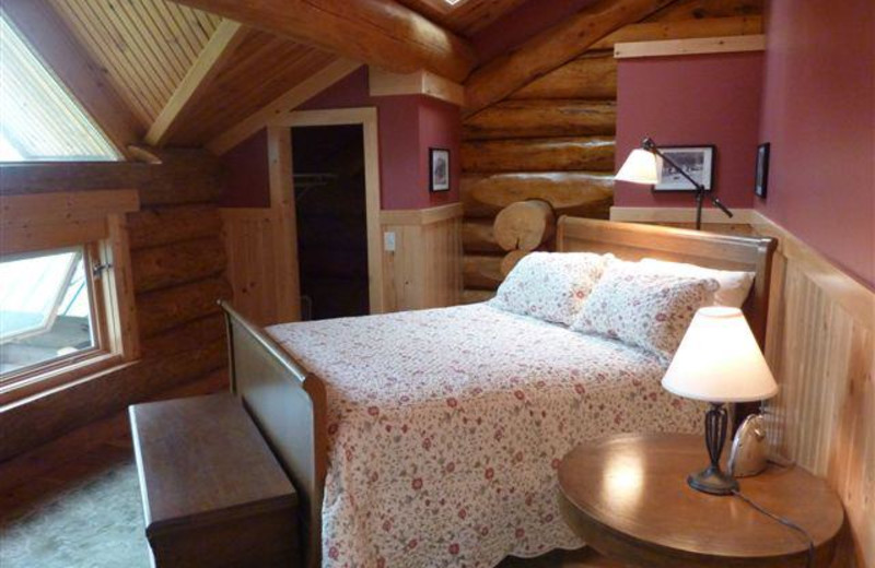 Cabin bedroom at Ely Lodging.