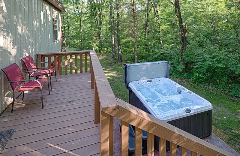 Cabin hot tub at Willowbrook Cabins.