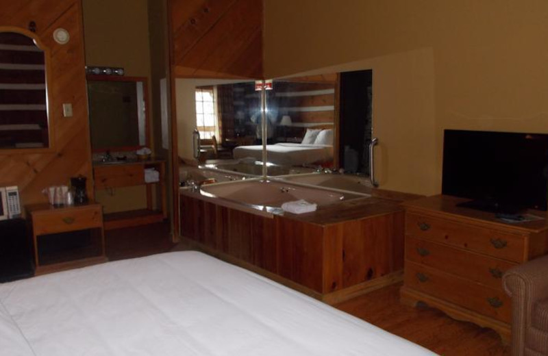Guest room with hot tub at Timbers Lodge.