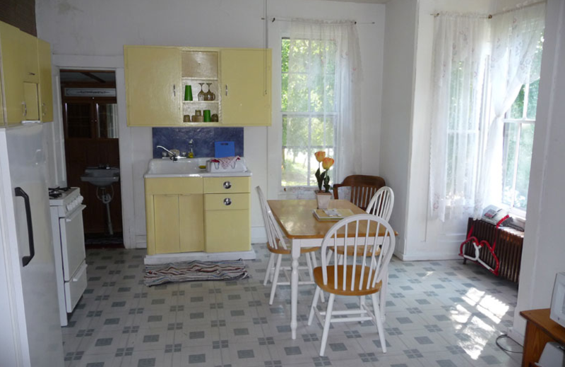 Bay Harbor Suite kitchen at The Elms Waterfront Cottages.