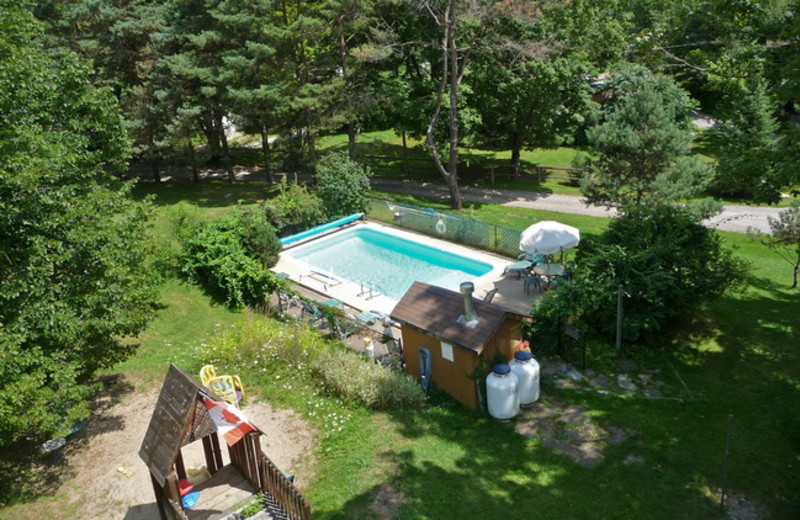 Outdoor pool at Ogopogo Resort.