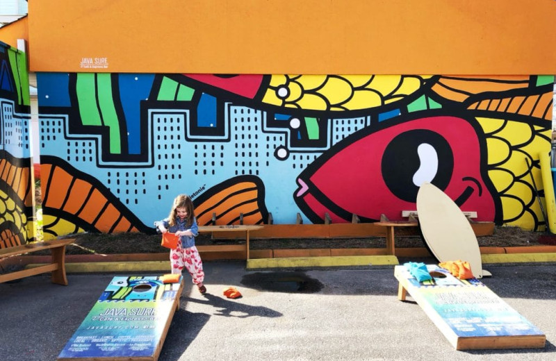 Bean bag toss at Coastal Accommodations.