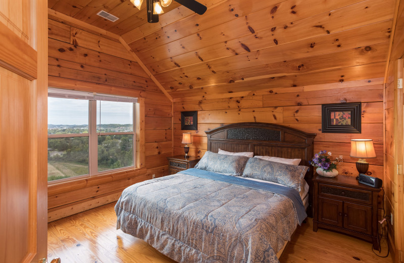 Bedroom at American Patriot Getaways - Pigeon Forge View.