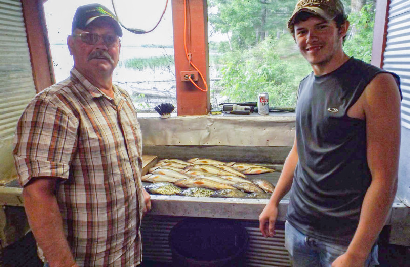 Fish cleaning at Driftwood Resort.