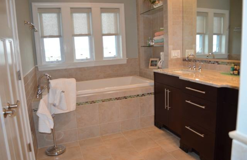 Vacation rental bathroom at Century 21 Action Inc.