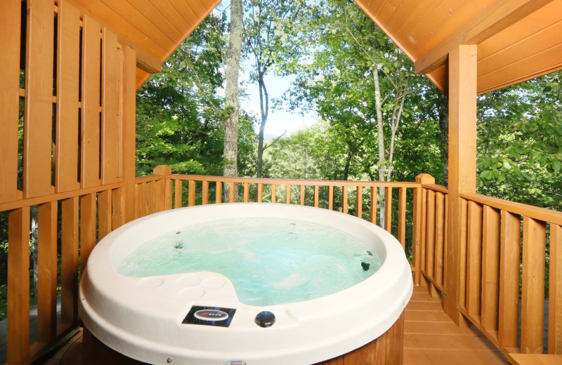 Cabin hot tub at Little Valley Mountain Resort.