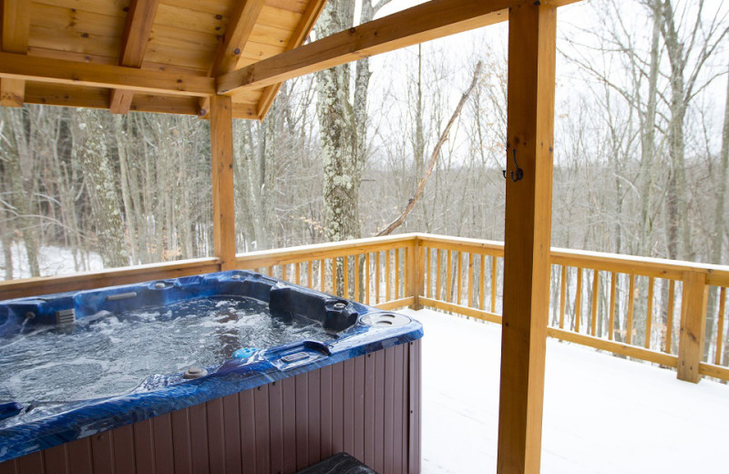 Cabin hot tub at Aspen Ridge.