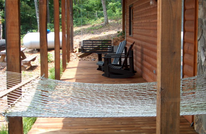 Cabin deck with hammock at Avenair Mountain Cabins.