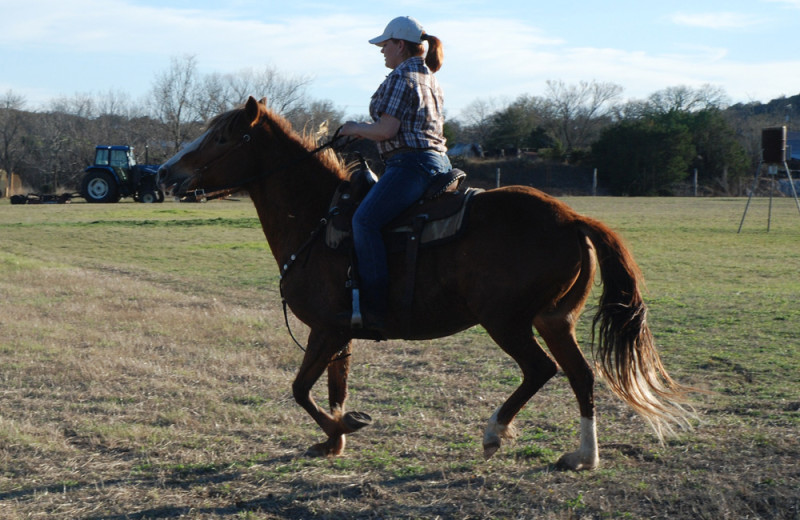 Horseback riding at Fredericksburg Ranch.
