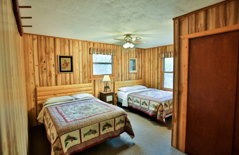 Cabin bedroom at Northern Lights Resort & Outfitting.