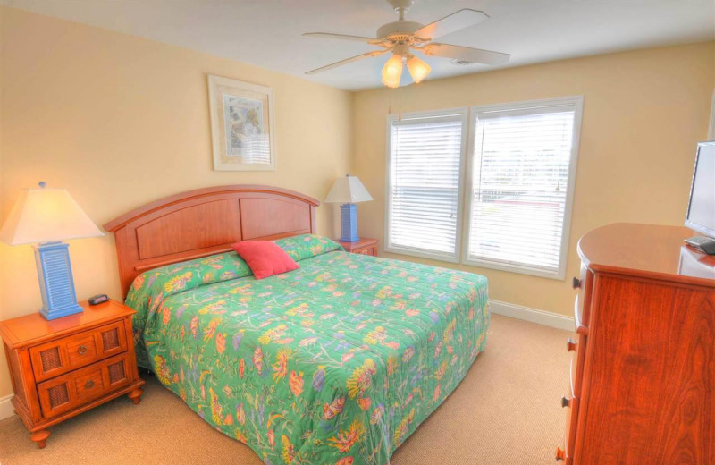 Rental bedroom at CondoLux Vacation Rentals.