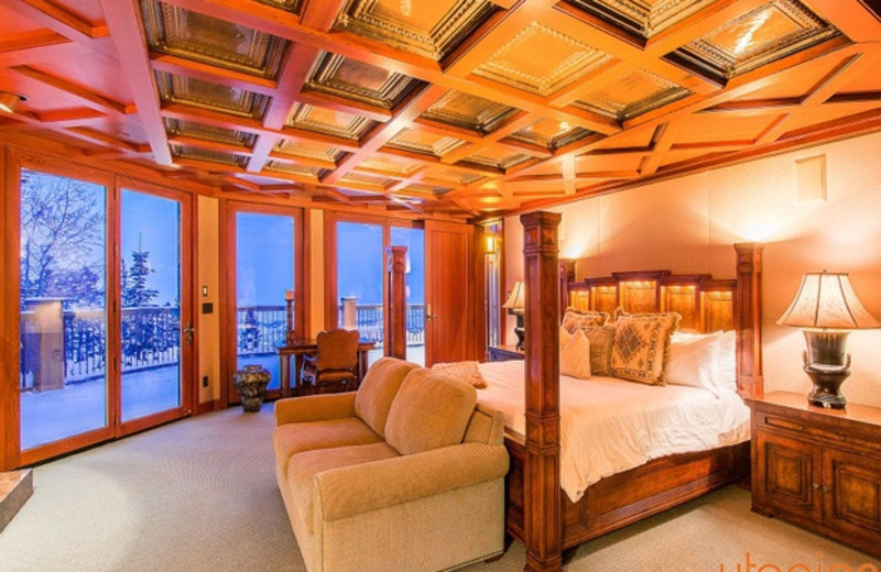 Rental bedroom at Utopian Luxury Vacation Homes.