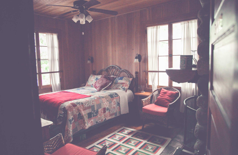 Cabin bedroom at The Hideaway at Xanadu Island.